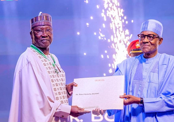 Boss Mustapha  Receives Commander of the Order of the Federal Republic Award From President Muhammadu Buhari